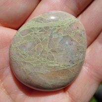 Light coloured quartzite with lace-like threads.